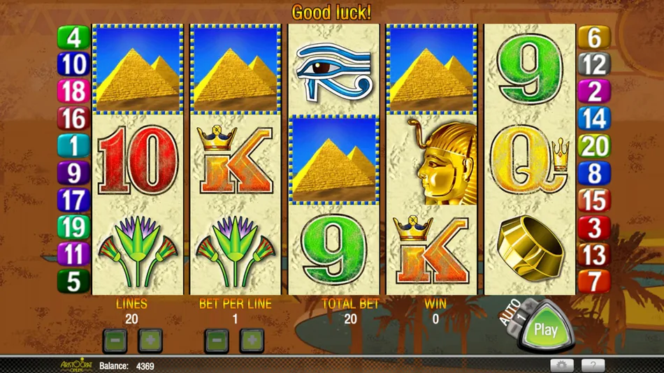 Three pyramid scatter symbols on separate reels triggering 15 free games